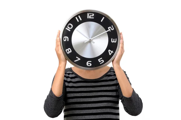 Young woman covered her face with clock against white — Stock Photo, Image