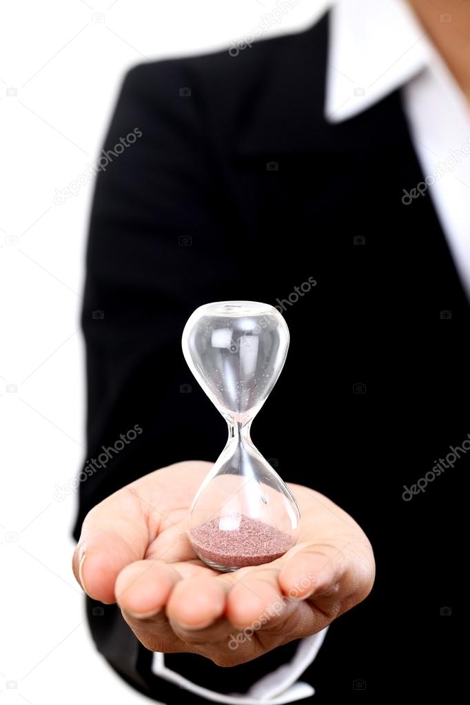 Business woman holding hourglass 
