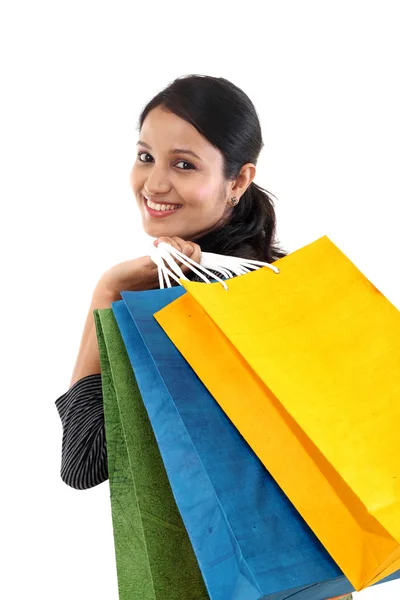 Joven feliz mujer sonriente con bolsas de compras —  Fotos de Stock