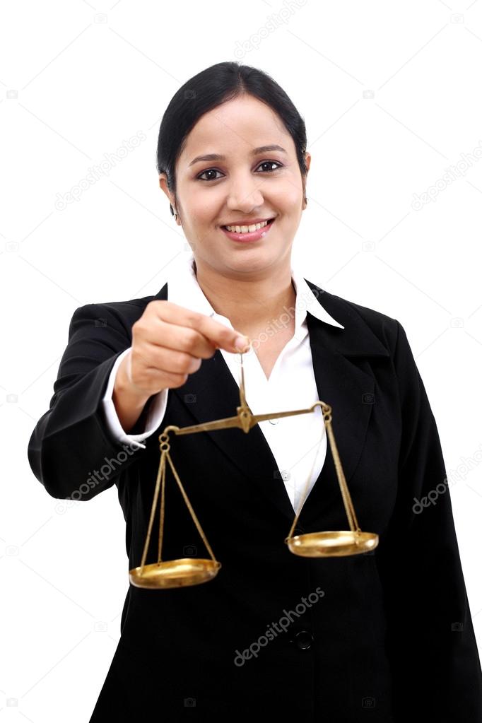 Young business woman holding the justice scale