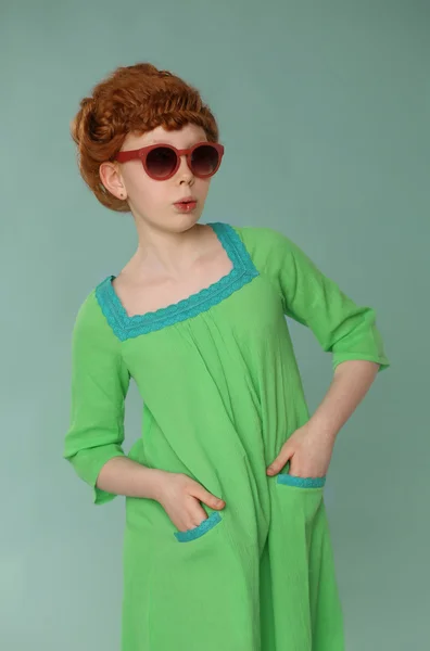 Redhead little girl in sunglasses — Stock Photo, Image