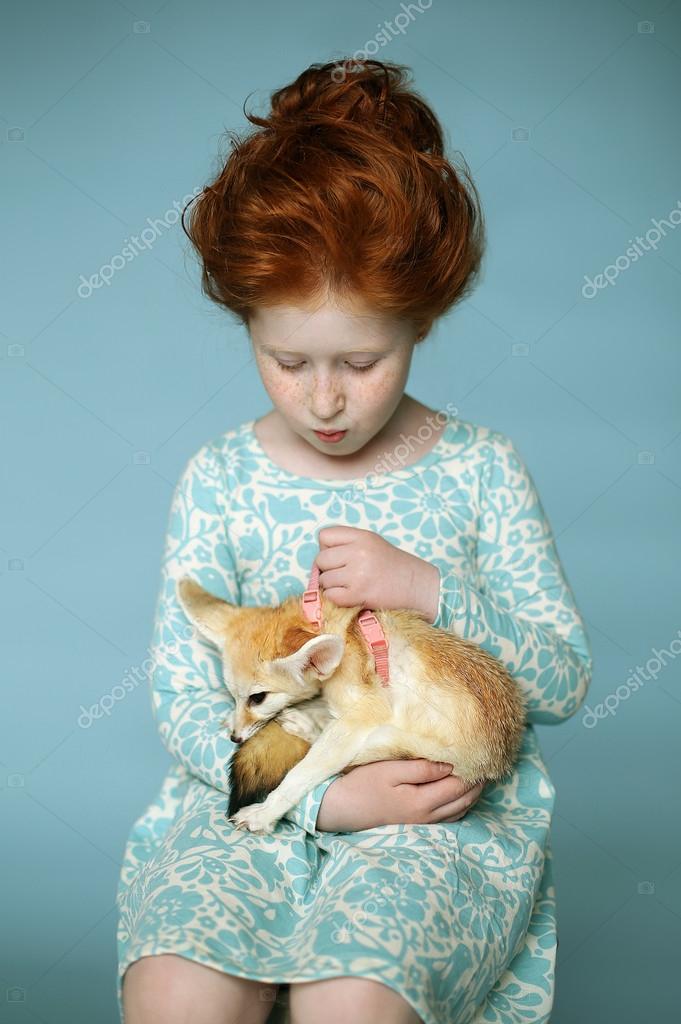 Beautiful girl with Fennec fox — Stock Photo © ogs13 83854434