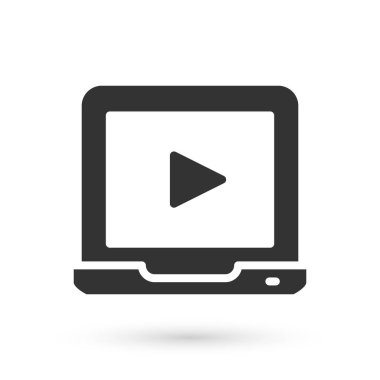Gri Online video oynatma simgesi beyaz arkaplanda izole edildi. Dizüstü bilgisayar ve oyun işaretli film şeridi. Vektör