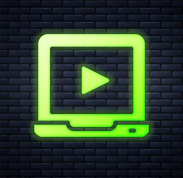 Neon incandescente Icona video gioco online isolato su sfondo muro di mattoni. Laptop e pellicola striscia con segno di gioco. Vettore — Vettoriale Stock