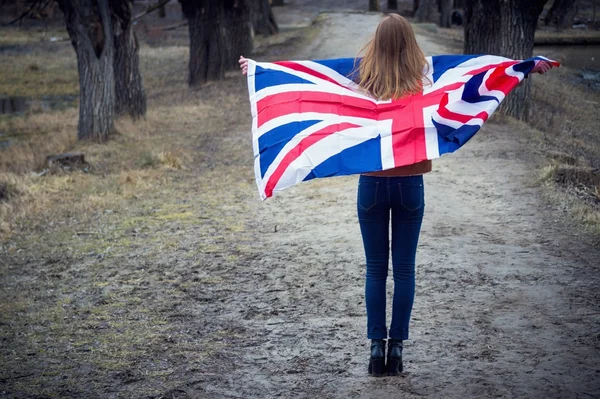 Rodoruzhuye girl with the flag of Great Britain Palm Valley — Stock Photo, Image