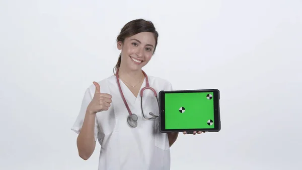 Médecin Féminin Tournant Pliant Les Bras Tout Souriant Déplaçant Vers Photo De Stock