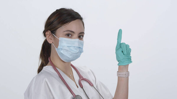 Female Doctor Turning Folding Arms While Smiling Moving Them White Stock Image