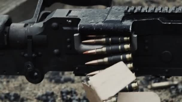 belt-fed machine gun as it is fired. Stock Footage