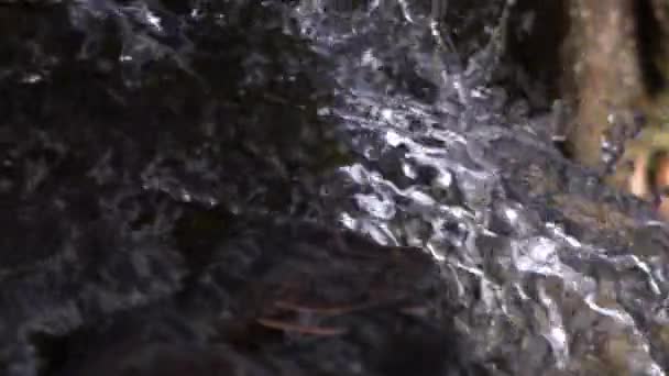 Water rushing over rock — Stock Footage Water rushing over rock Stock Video
