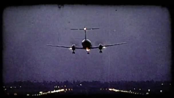 Plane lands on runway. Vintage stylized video clip. — Stock Video