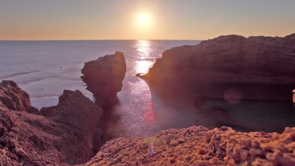 The rocky Dor Beach coast at sunset in Israel. — Stock Video