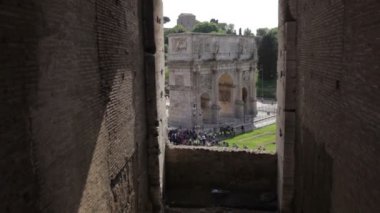Arch of Constantine through a window in the Colosseum
