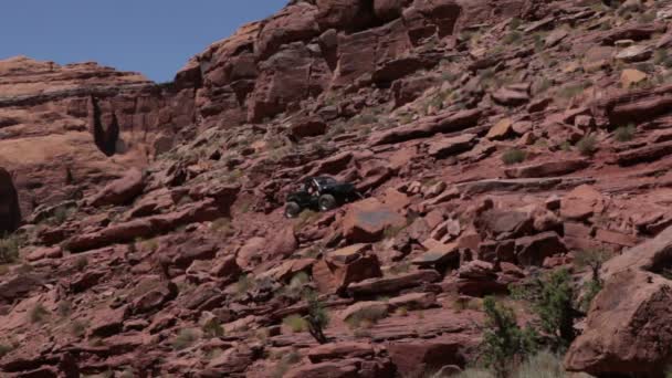 Jeep climbing over rocks in Moab — Stock Video