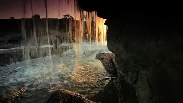 Inside shot of a waterfall in Kenya at sunset. — Stock Video