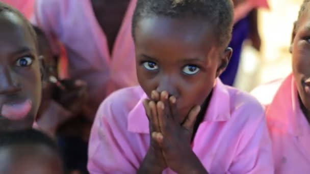 Kids playing near a village in Africa. — Stock Video