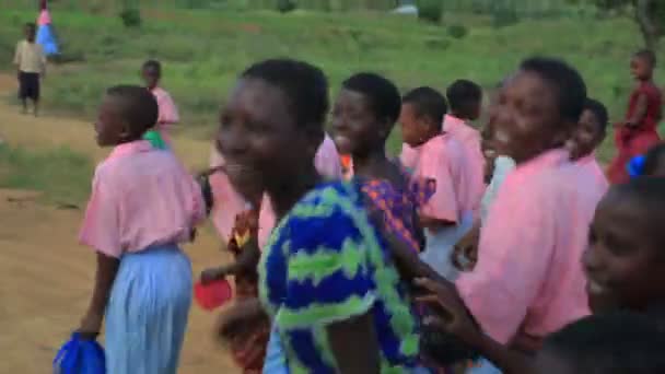 Some Children running alongside a car in Kenya. — Stock Video