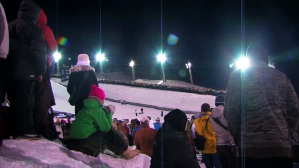 Skiing competition with big crowds. — Stock Video
