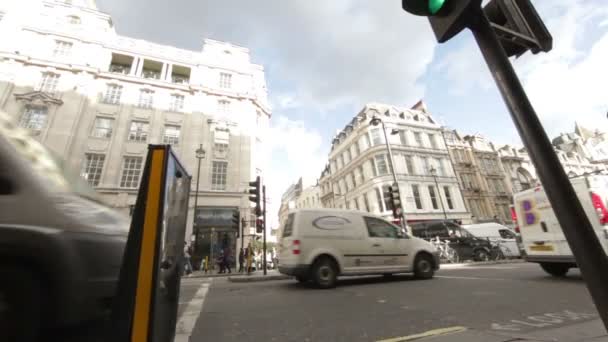 Busy street with crowded sidewalks — Stock Video