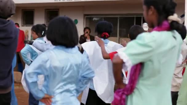 African kids dancing during class outside. — Stock video