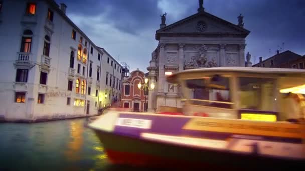 Water taxi passes in front of San Stae — Stock Video