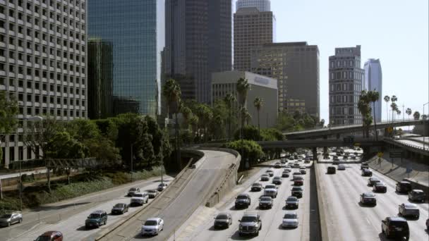 Skyscrapers and traffic from bridge in Los Angeles. — Stock Video