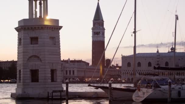 Tilting down shot of Piazza San Marco to the wharf and canal. — Stock Video
