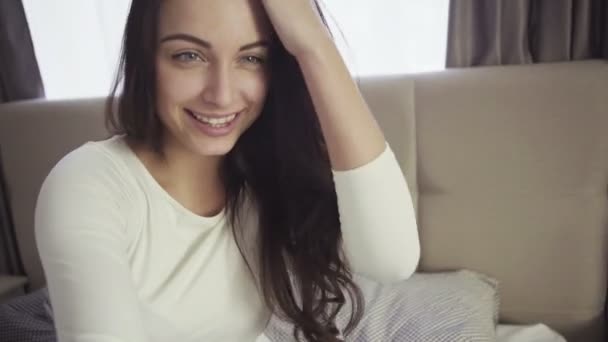 Girl makes funny expressions for selfie picture, young female uses smartphone. — Stockvideo