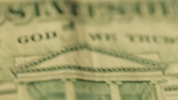 Extreme close-up dolly beelden van ons dollar biljetten. — Stockvideo