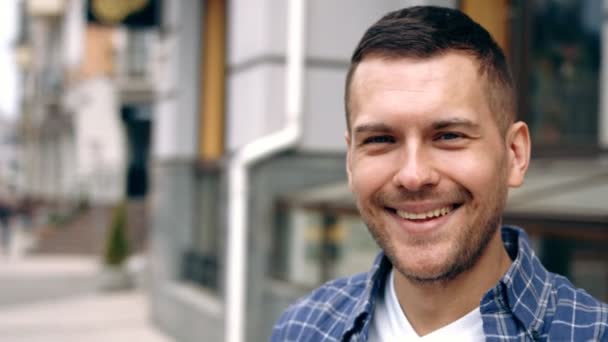 Portrait of happy young man in the city  Slow Motion — Stock Video