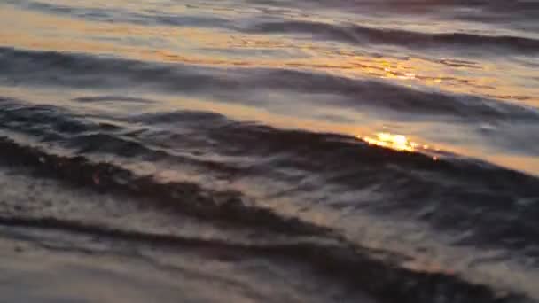 Small wave breaking on camera shot in slow-motion from underwater. — Stock Video