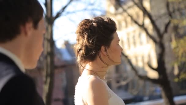 The groom comes to his beautiful bride, they laugh and rejoice shot in slow motion  close up — Stock Video