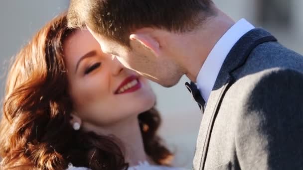 young married couple kissing shot in slow motion  close up