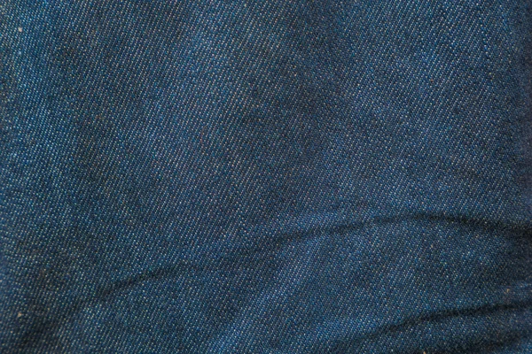 Tejido jeans textura fondo. —  Fotos de Stock