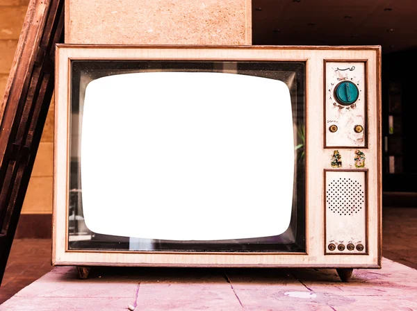 Old vintage retro television on brick shelf with white — ストック写真