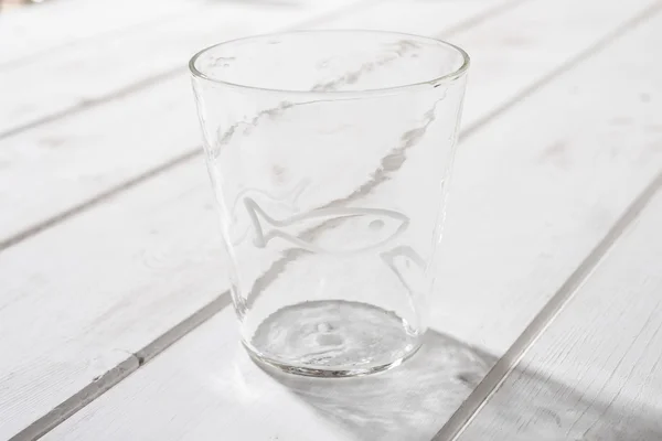 Crystal Drinking Glass with White Fish Design — Stock Photo, Image