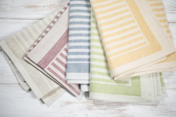 Folded Table Napkins with Woven Stripe Designs of Various Colors — Stock Photo, Image