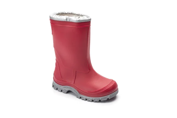 Piros gyermek wellington rain boot egy fehér háttér — Stock Fotó