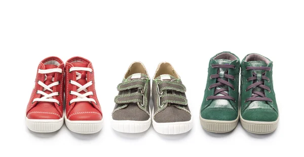 Tres pares de zapatos coloridos para niños —  Fotos de Stock
