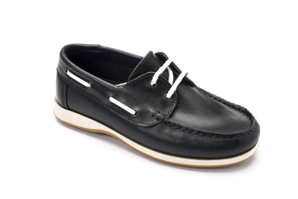 Zapato de lona negra sobre fondo blanco —  Fotos de Stock