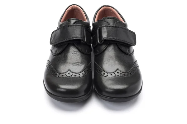 Boys black school shoes on a white background on a white backgro — Stock Photo, Image