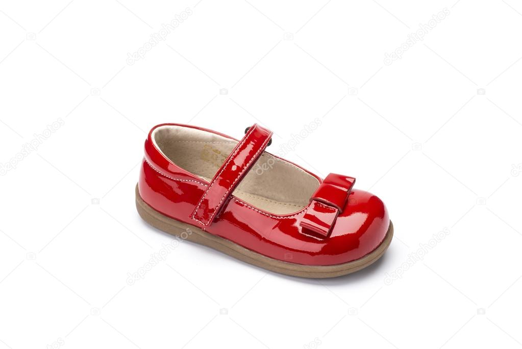 Zapato rojo para niños sobre un blanco: fotografía de stock © stock@photographyfirm.co.uk #103190758 | Depositphotos
