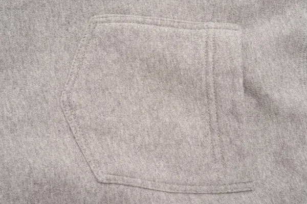 Pocket of Grey Shirt