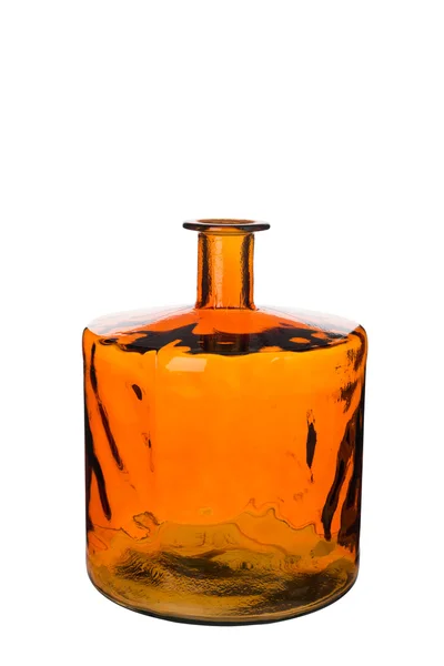 Короткая пустая оранжевая цилиндрическая бутылочная ваза — стоковое фото