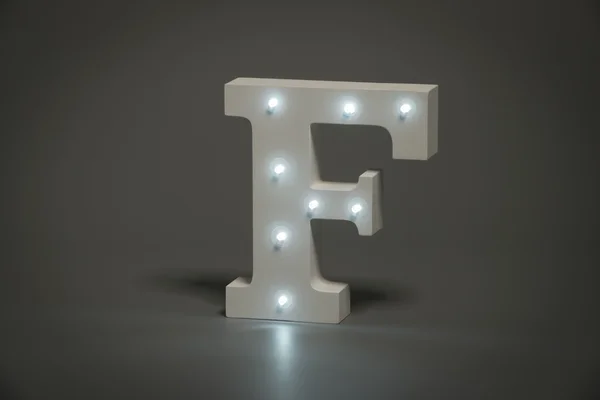 Lettera decorativa F con luci LED incorporate — Foto Stock