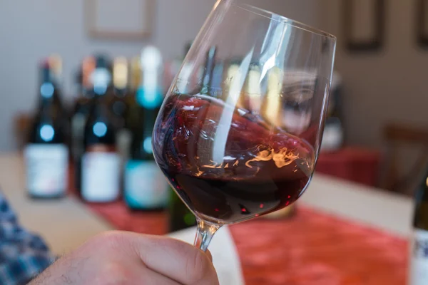 Swirling Red Wine in a Wineglass