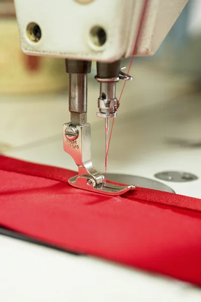 Sewing Machine Needle Fastening Red Cloth and Satin Ribbon — Φωτογραφία Αρχείου