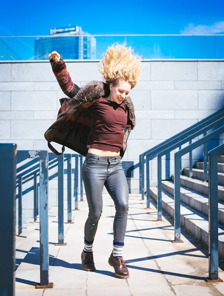 Young Hipster curly woman having fun in the city downtown — Stock Photo, Image