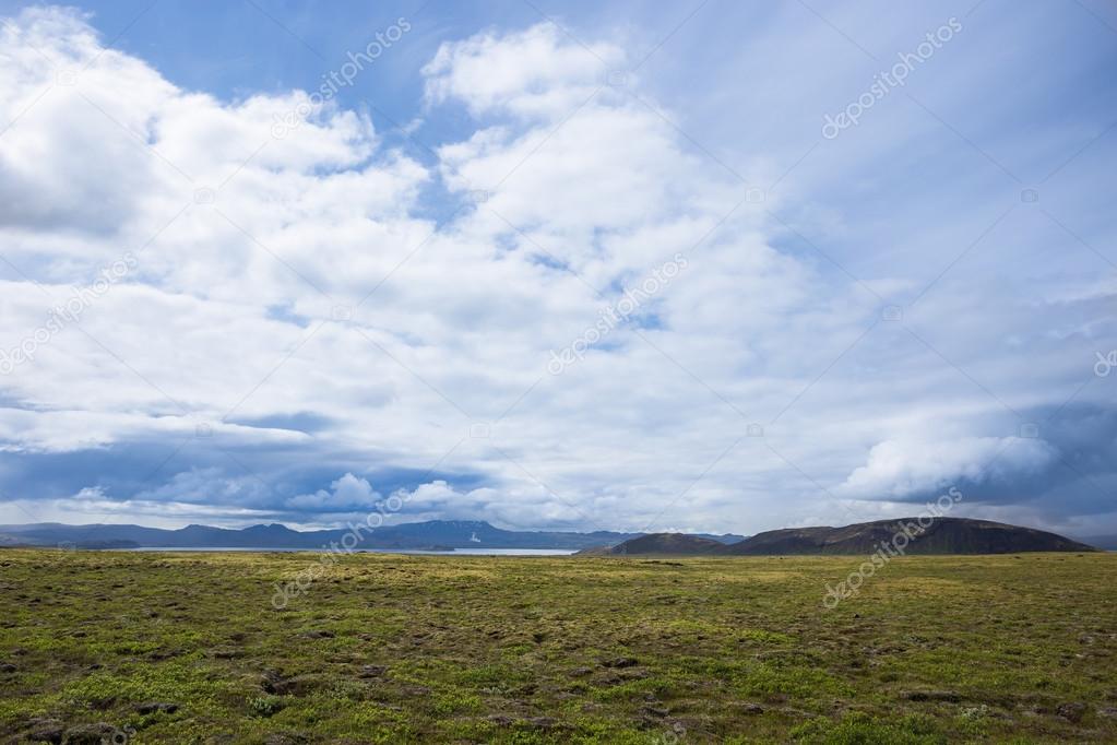 Sky with clouds and hills landscape in Iceland