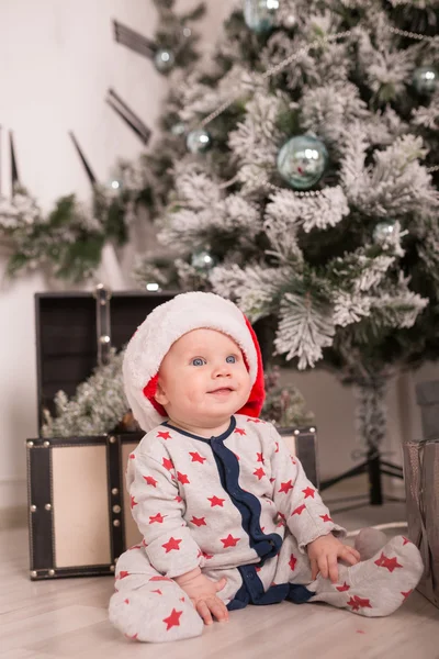 Beautiful little baby celebrates Christmas — Stock Photo, Image