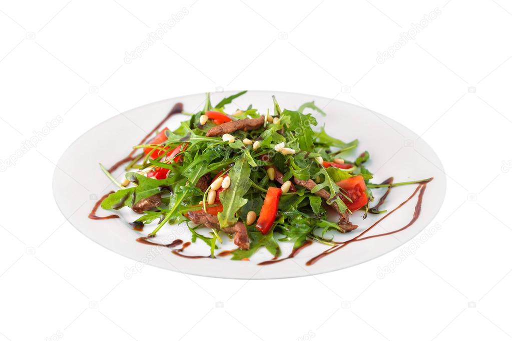 bowl of fresh rucola salad with cherry tomatoes